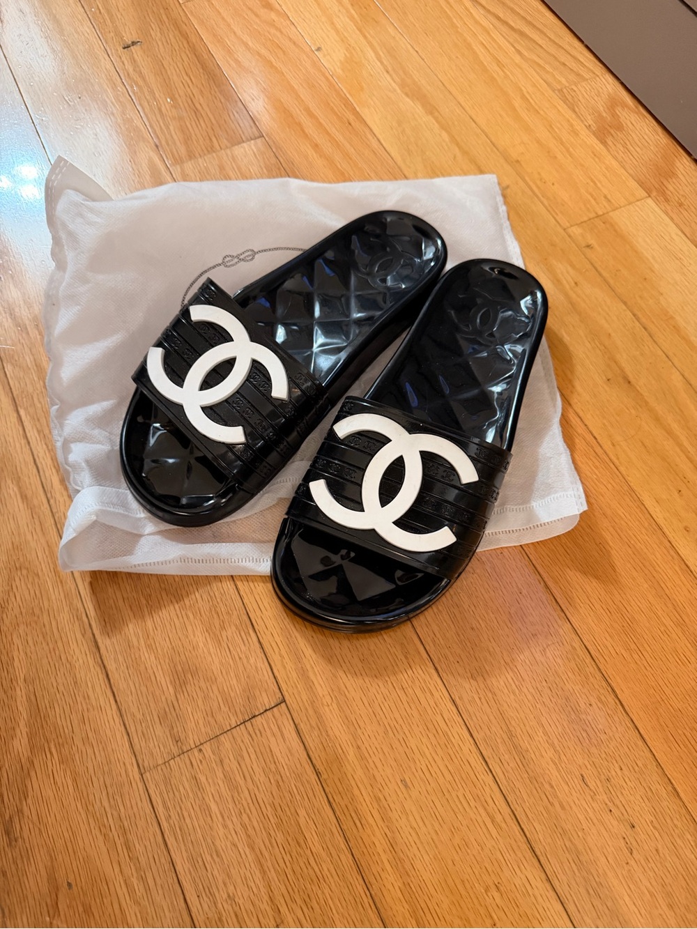 CHANEL Black Slide Sandals with White CC Logo
